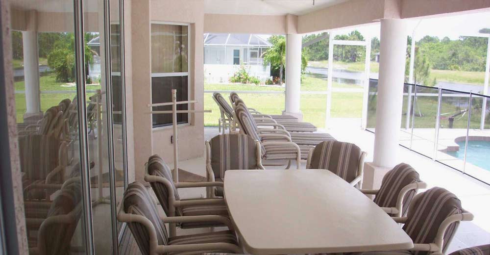 pool side dining table at villa ellysian